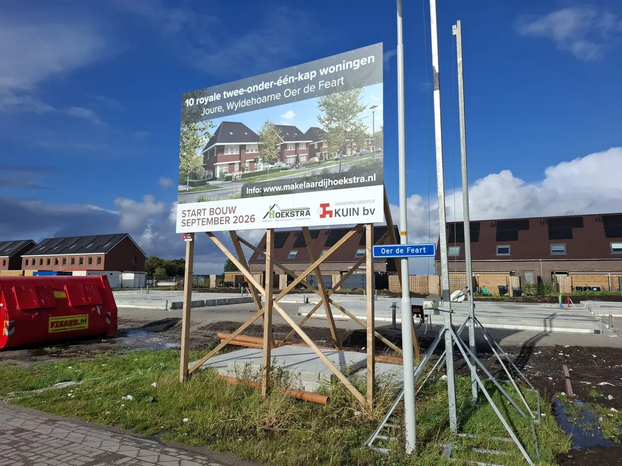 Bouwbord van Wyldehoarne op het bouwterrein met de tekst start bouw september 2026